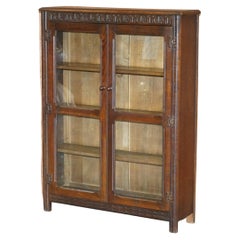 Vintage circa 1940's English Oak Jacobean Revival Glazed Door Library Bookcase