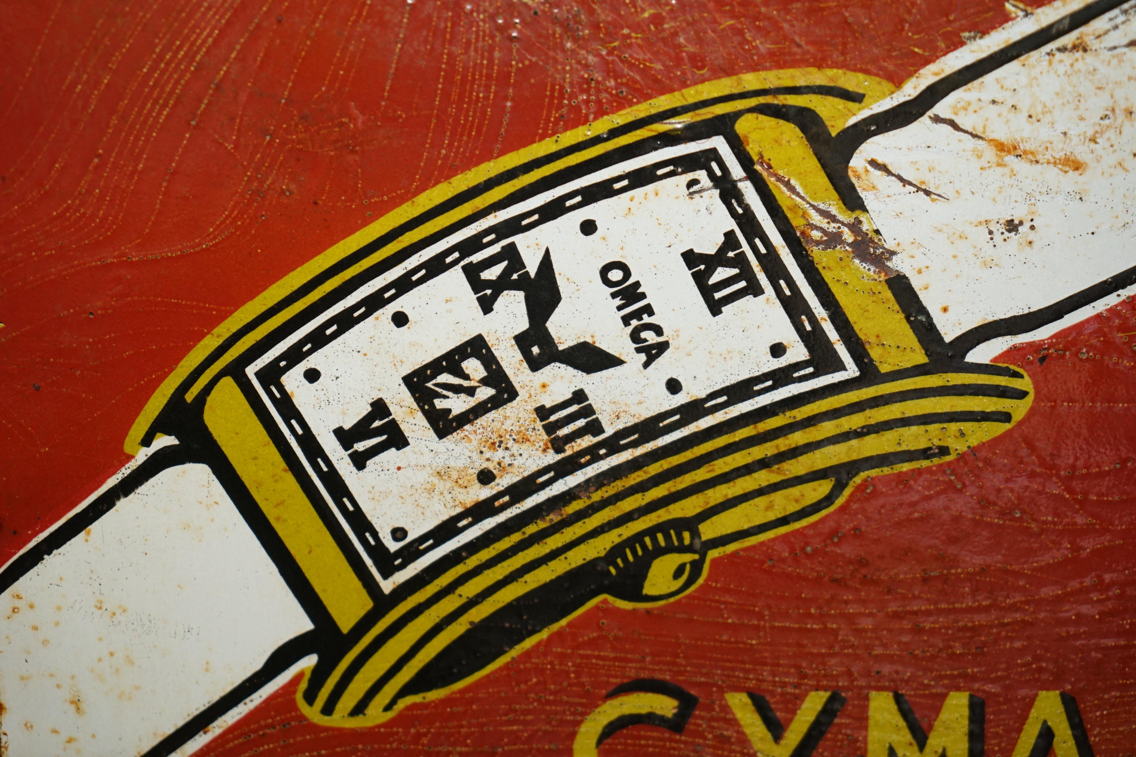 Fatto a mano INSEGNA PUBBLICITARIA IN PORCELLANA E SMALTO D'EPOCA DI CIRCA 1940 OMEGA CYMA TISSOT in vendita