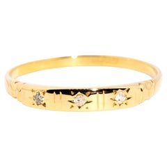 Vintage circa 1950s 18 Carat Yellow Gold Star Set Round Brilliant Diamond Band