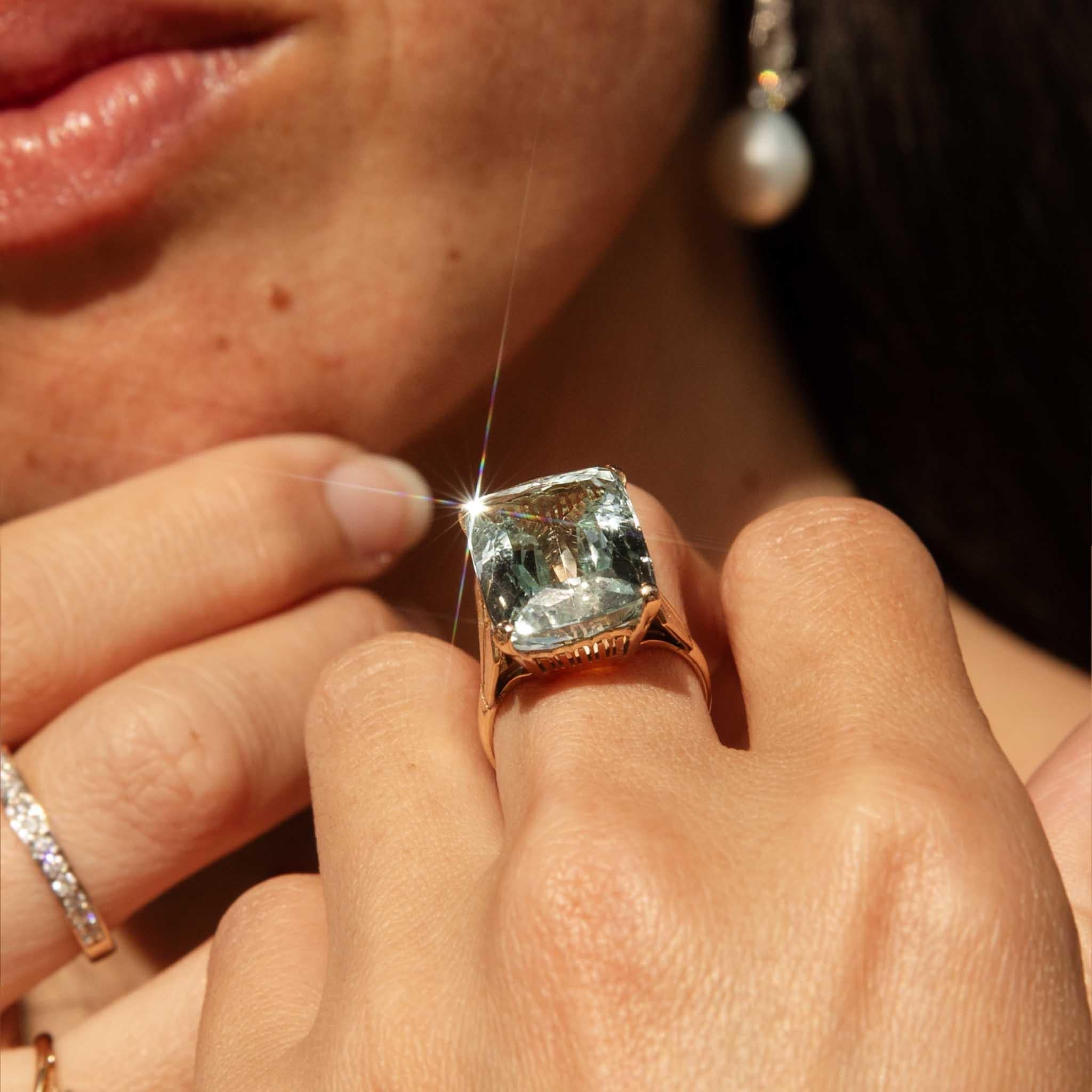 A serene aquamarine, beautifully crafted in 11 carat gold evokes the calm of the ocean. Bold in size, subtle in design, we have named her Cove. A perfect representation of natures riches, she is a timeless beauty.

The Cove Ring Gem Details
The