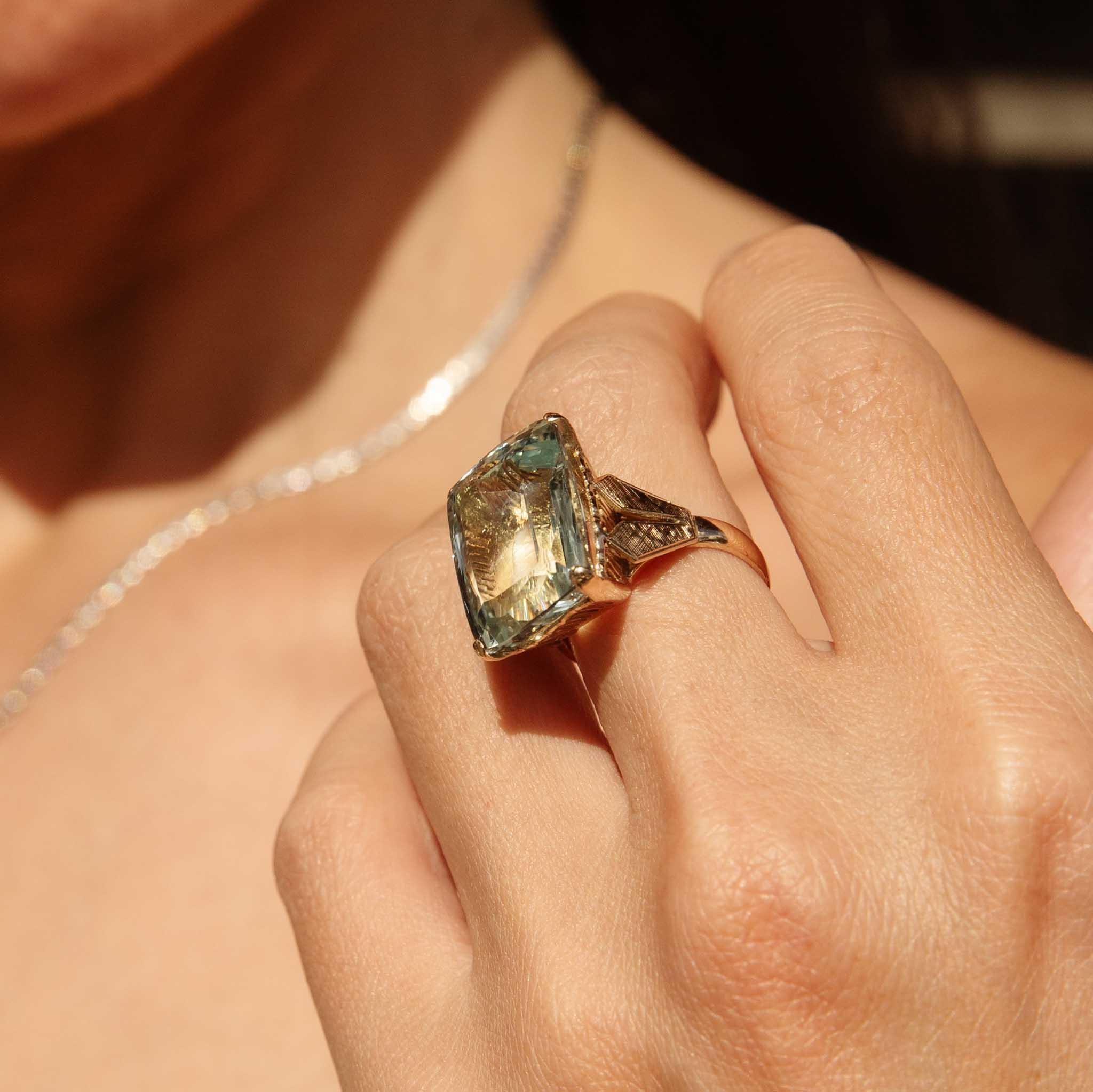 Emerald Cut Vintage Circa 1950s Bright Light Blue Aquamarine Ring 11 Carat Yellow Gold For Sale