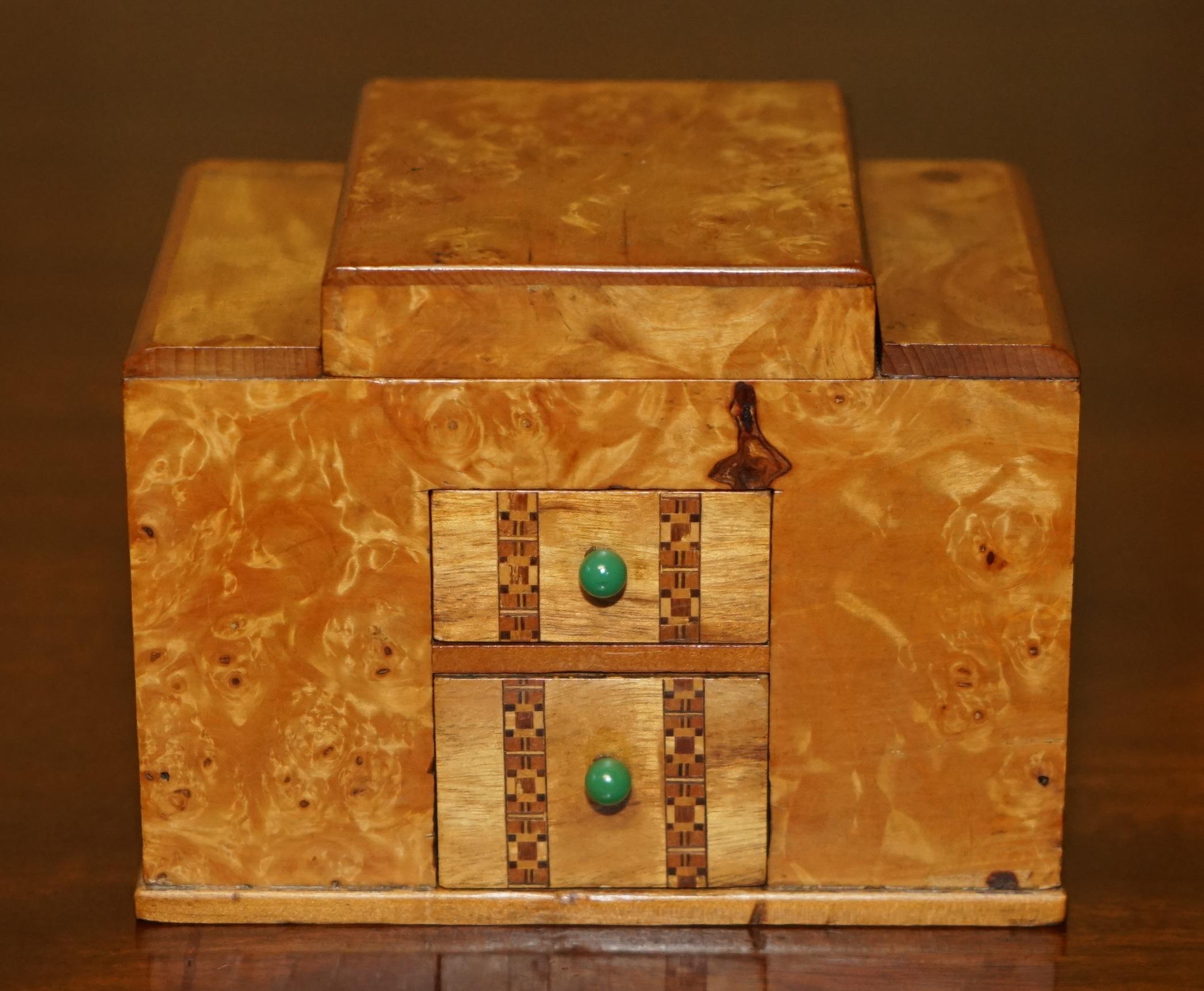 Royal House Antiques

Royal House Antiques is delighted to offer for sale this lovely miniature Folk Art Burr Walnut Cigarette or Cigar dispenser circa 1950’s

This is part of a small suite, I have three in total, they are a burr walnut cabinet, a