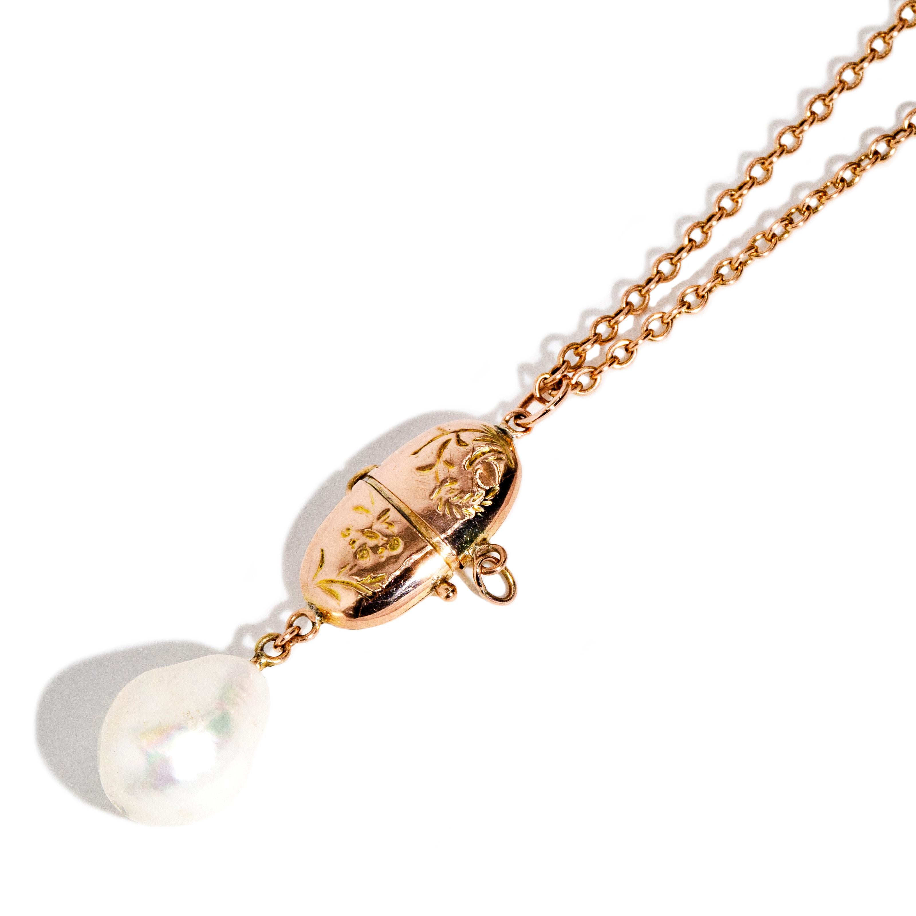 Modern Vintage Circa 1950s Pearl Capsule 14 Carat Gold Pendant & 9 Carat Gold Chain For Sale