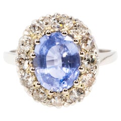 Vintage circa 1950s Platinum Ceylon Blue Sapphire & Diamond Halo Cluster Ring
