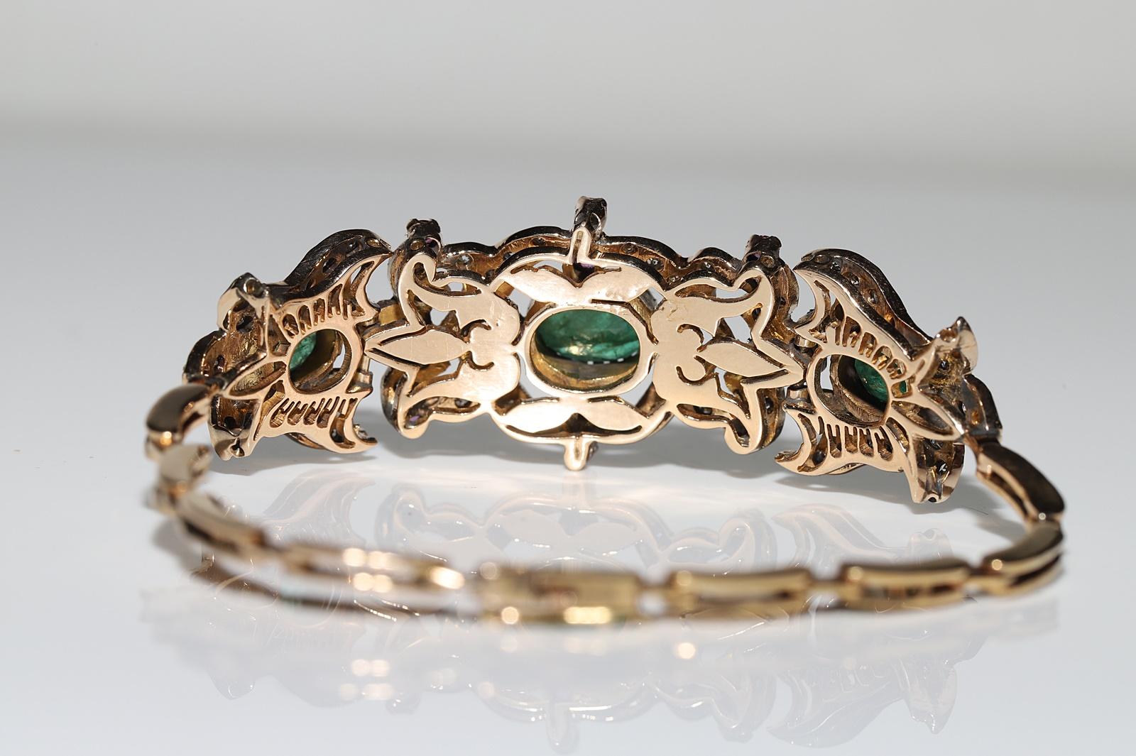 Bracelet vintage des années 1960 en or 14 carats avec diamants naturels, émeraudes et rubis en vente 6