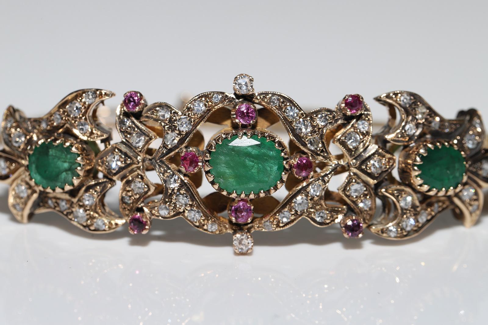 Bracelet vintage des années 1960 en or 14 carats avec diamants naturels, émeraudes et rubis en vente 9