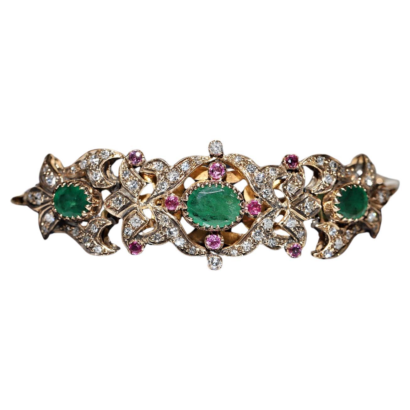 Bracelet vintage des années 1960 en or 14 carats avec diamants naturels, émeraudes et rubis en vente