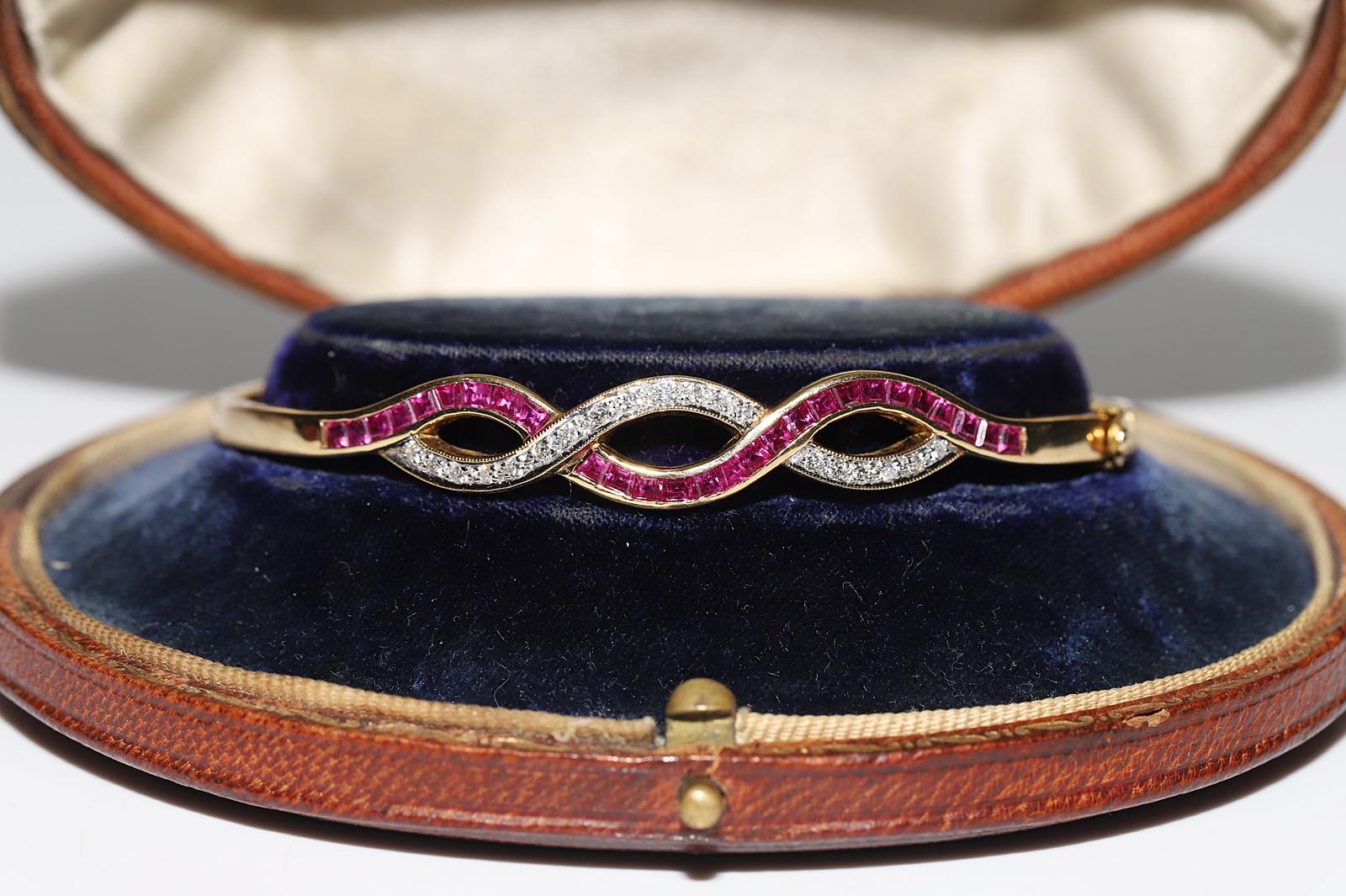 Women's Vintage Circa 1960s 18k Gold Natural Diamond And Caliber Ruby Bangle Bracelet  For Sale
