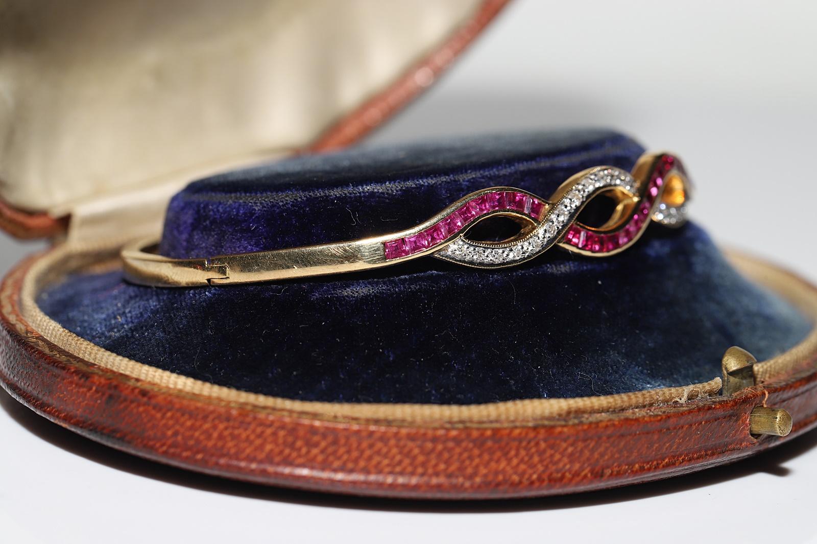 Vintage Circa 1960s 18k Gold Natural Diamond And Caliber Ruby Bangle Bracelet  For Sale 2