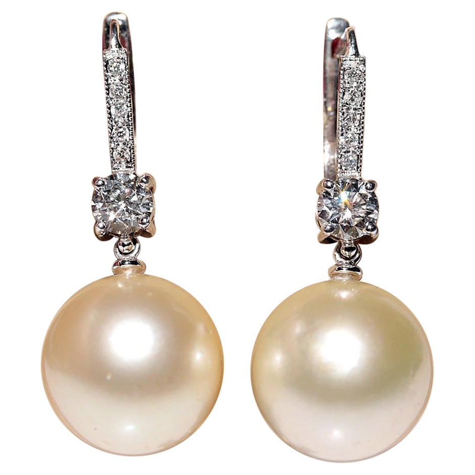 Boucles d
oreilles vintage des années 1960, en or 18 carats, diamant naturel et perle d
océan naturelle