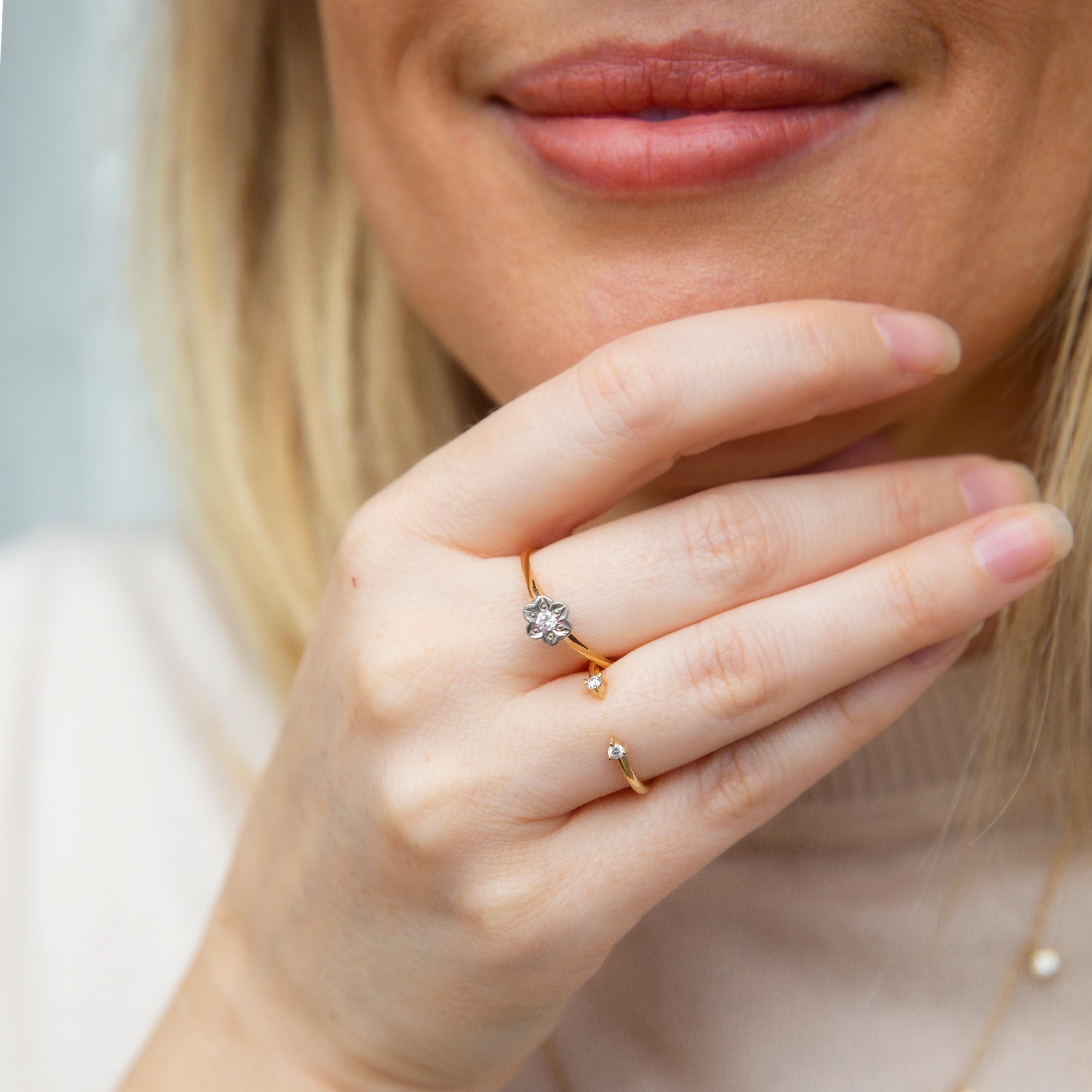 The Claire Ring, crafted in 18 carat gold is a vintage delight. Her sweet flower embellished with a single diamond is a celebration of nature's whimsy. A most precious inclusion in your collection.

The Claire Ring Gem Details
The round brilliant