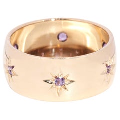 Vintage Circa 1960s Fuchsia Sapphire Band Ring 9 Carat Yellow Gold