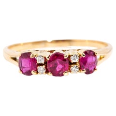 Vintage Circa 1960s Oval Natural Red Ruby & Diamond Ring 14 Carat Yellow Gold