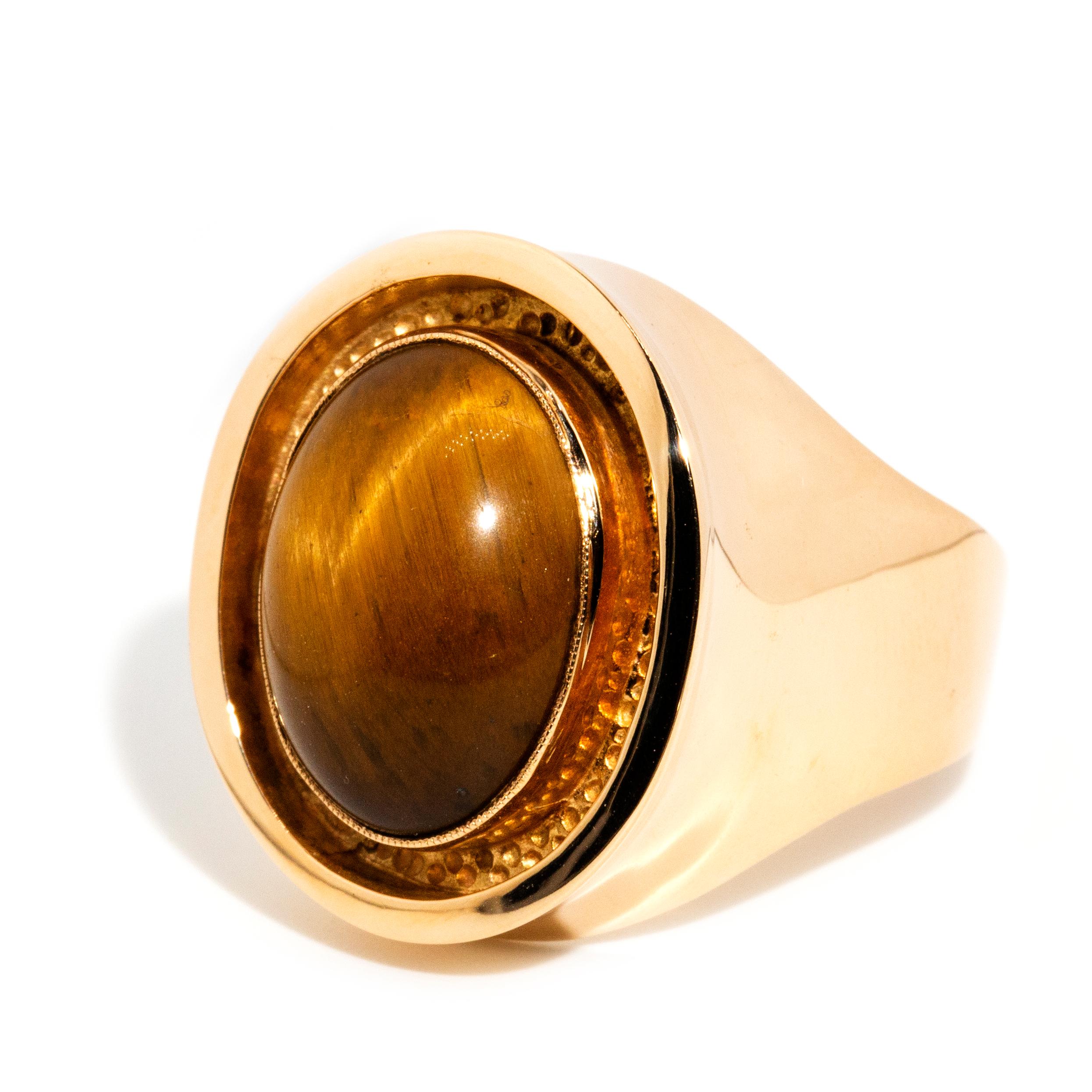 Vintage Circa 1960s Oval Tigers Eye Cabochon Flared Ring 14 Carat Yellow Gold In Good Condition In Hamilton, AU