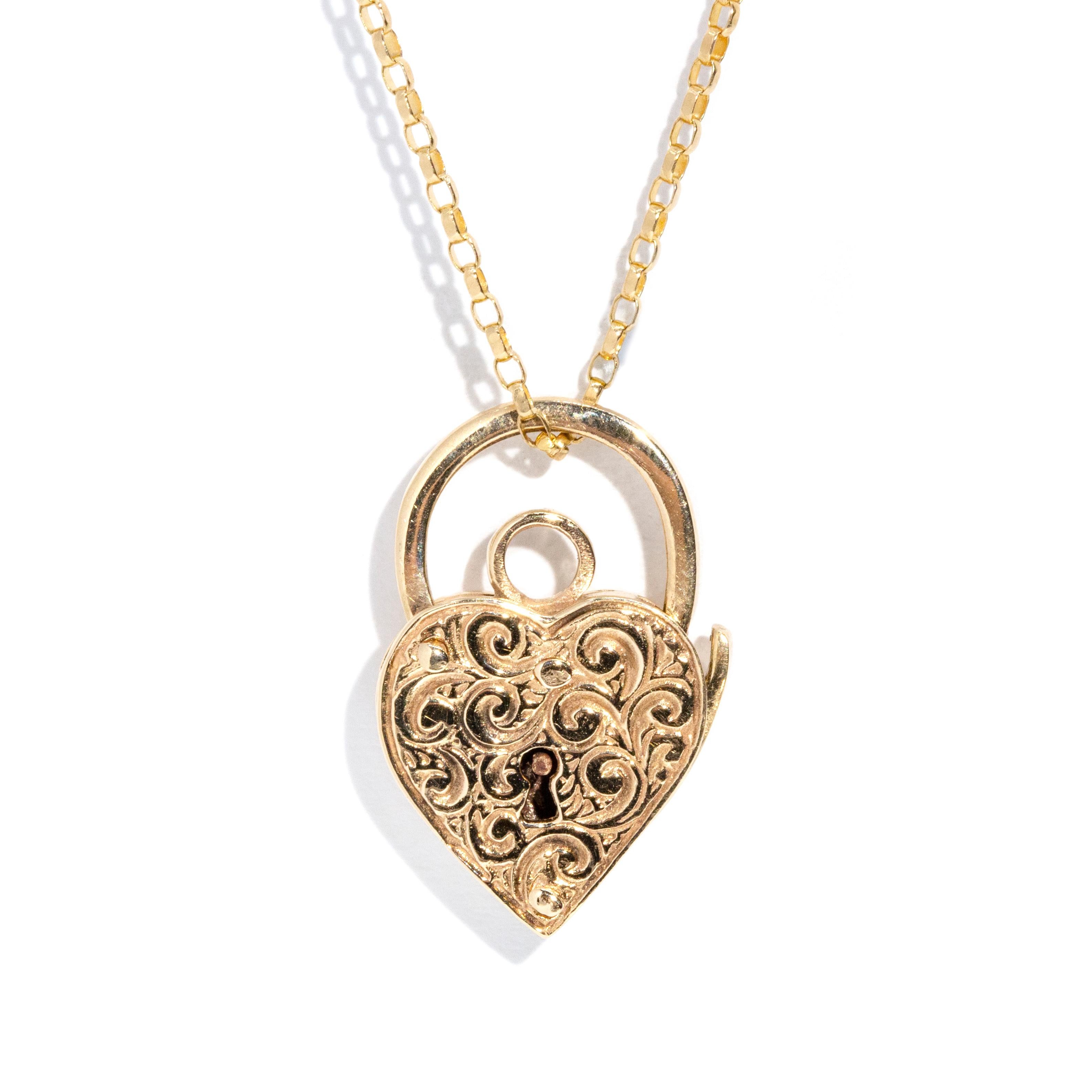 Modern Vintage Circa 1960s Patterned Heart Padlock Pendant & Chain 9 Carat Yellow Gold For Sale