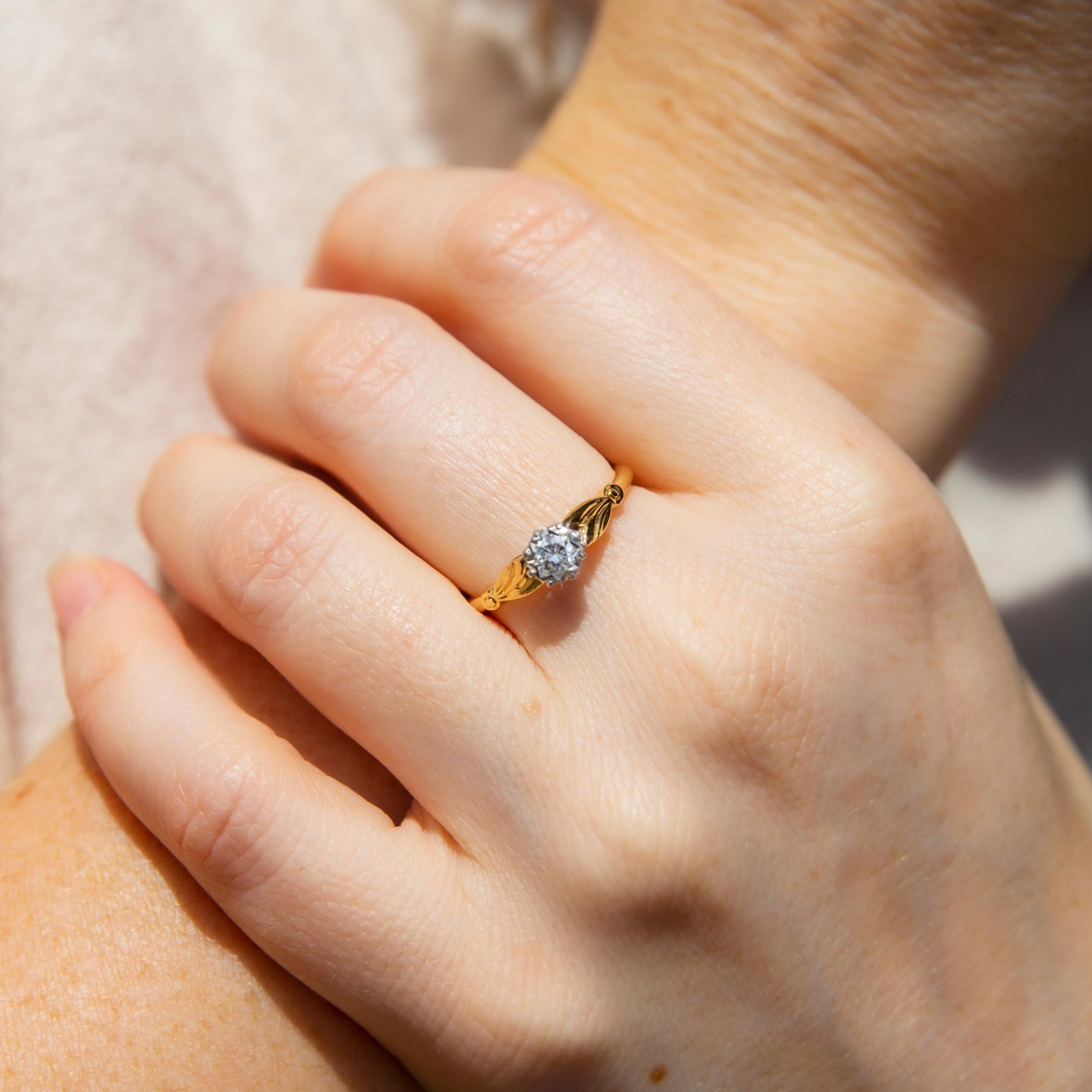 Lovingly crafted in 18 carat gold, The Anita Ring is a vintage enchantment. Her band reaches up on leaf-like shoulders to present a diamond cradled in white gold. A sweet promise.

The Anita Ring Gem Details 
The round brilliant cut diamond is