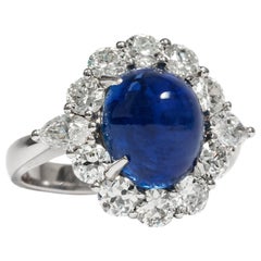 Vintage circa 1965, Certified 6.36 Carat No Heat Sugarloaf Sapphire Cluster Ring