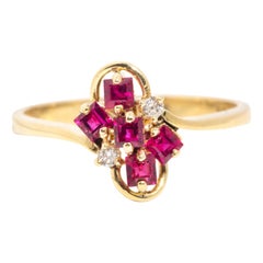 Vintage Circa 1970s 14 Carat Yellow Gold Asymmetrical Ruby and Diamond Ring
