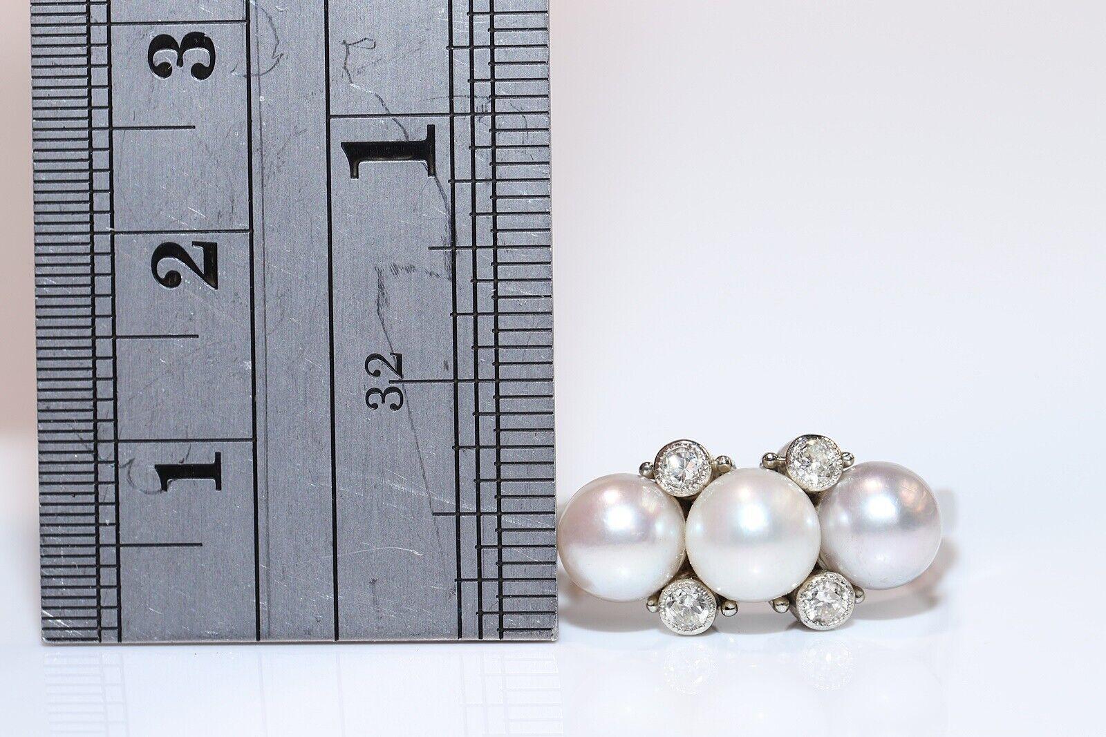 Bague vintage des années 1970 en or 14 carats avec diamant naturel et perle en vente 3