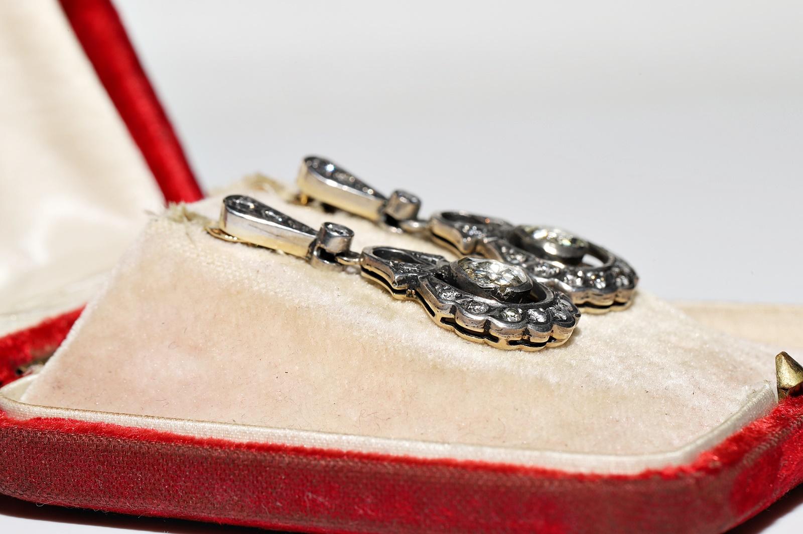 Circa 1970er Jahre  14k Gold Top Silber Natürlicher Diamant Dekorierter Tropfenohrring (Retro) im Angebot