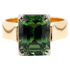 Vintage Circa 1970s 18 Carat Gold Emerald Cut Green Sapphire Solitaire Ring