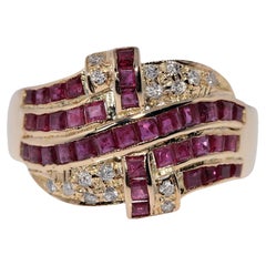 Vintage Circa 1970s 18k Gold Natural Caliber Cut Ruby And Diamond Decorated Ring