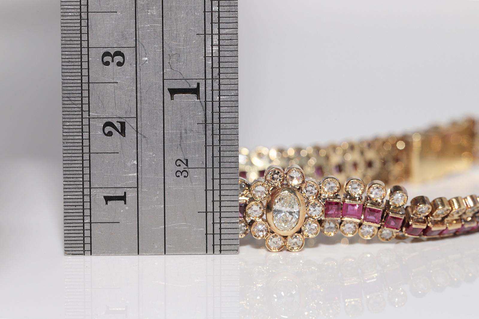 Vintage Circa 1970s 18k Gold Natural Diamond And Caliber Cut Ruby Bracelet For Sale 1