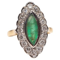 Vintage Circa 1970s 18k Gold Natural Diamond And Emerald Decorated Navette Ring 