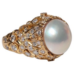 Anello decorato con diamanti naturali e perle in oro 18k, CIRCA ANNI 70