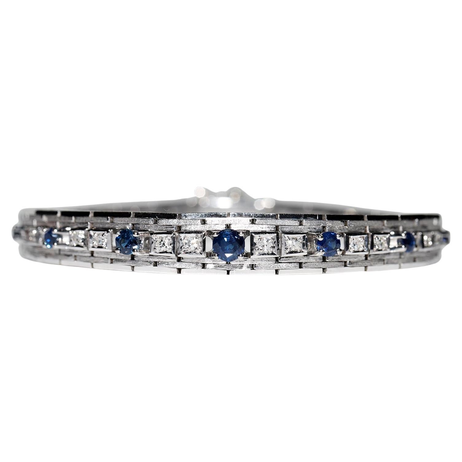Vintage Circa 1970s 18k Gold Natural Diamond And Sapphire Decorated Bracelet For Sale