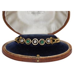 Bracciale da tennis con diamanti naturali taglio vecchio e smeraldi, vintage, CIRCA ANNI '70, 18 carati