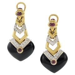 Vintage Circa 1970s 18KT Onyx, Ruby, and Diamond Drop Earrings
