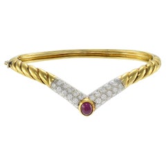 Vintage Circa 1970's 18kt Yellow Gold and Oval Cabochon Ruby Bracelet