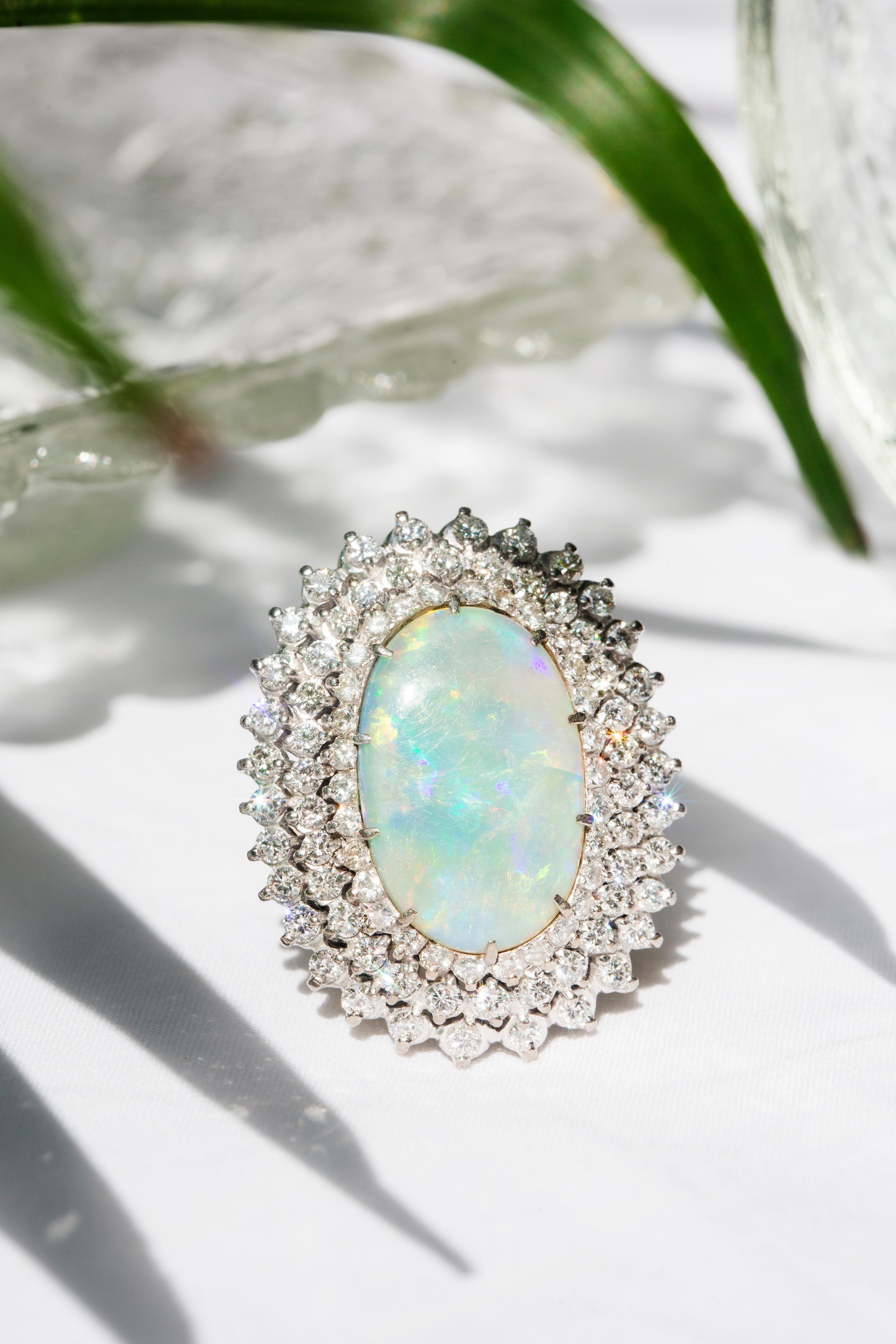 Vintage Circa 1970s Australian Oval Solid Opal & Diamond Halo Ring 18 Carat Gold For Sale 4