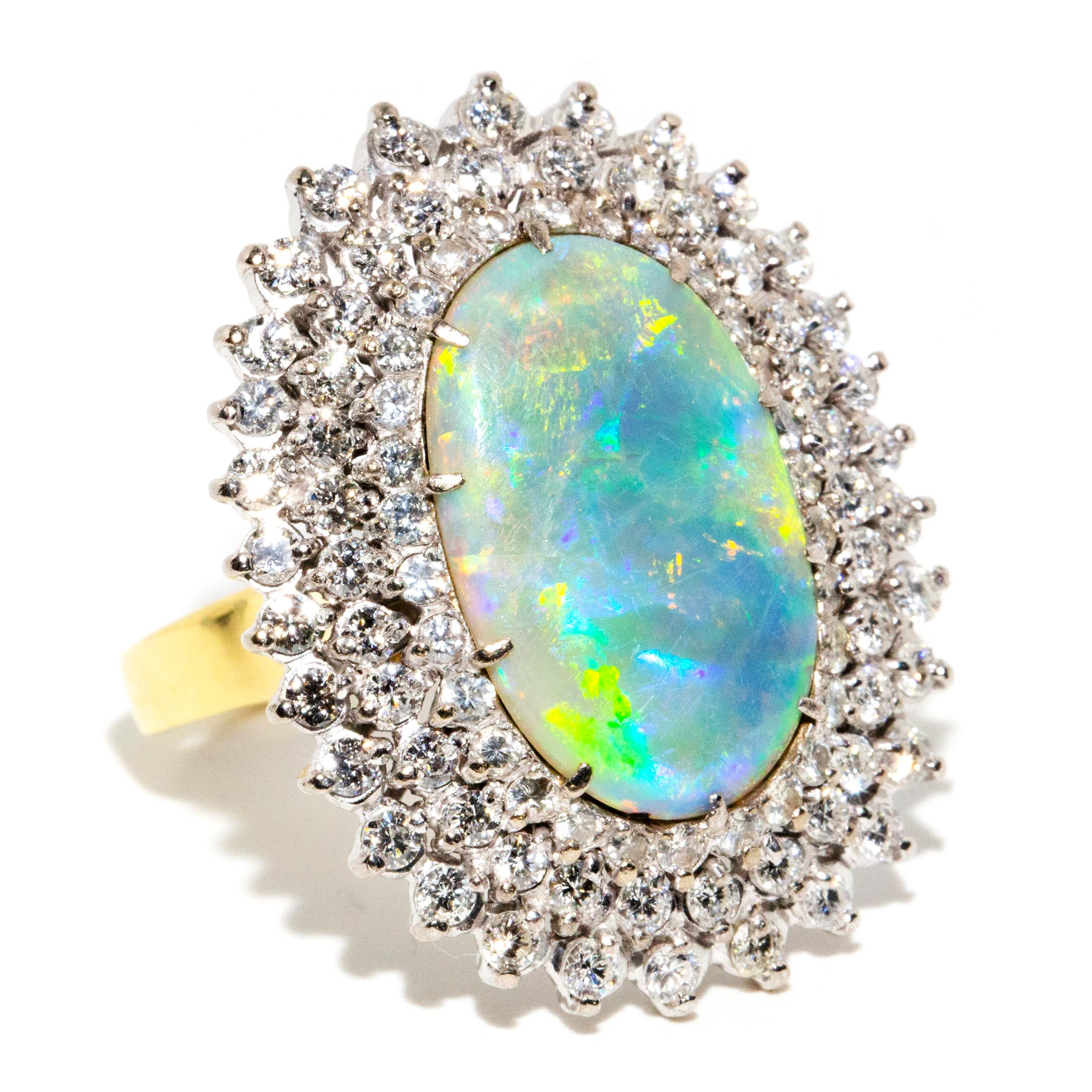 Cabochon Vintage Circa 1970s Australian Oval Solid Opal & Diamond Halo Ring 18 Carat Gold For Sale