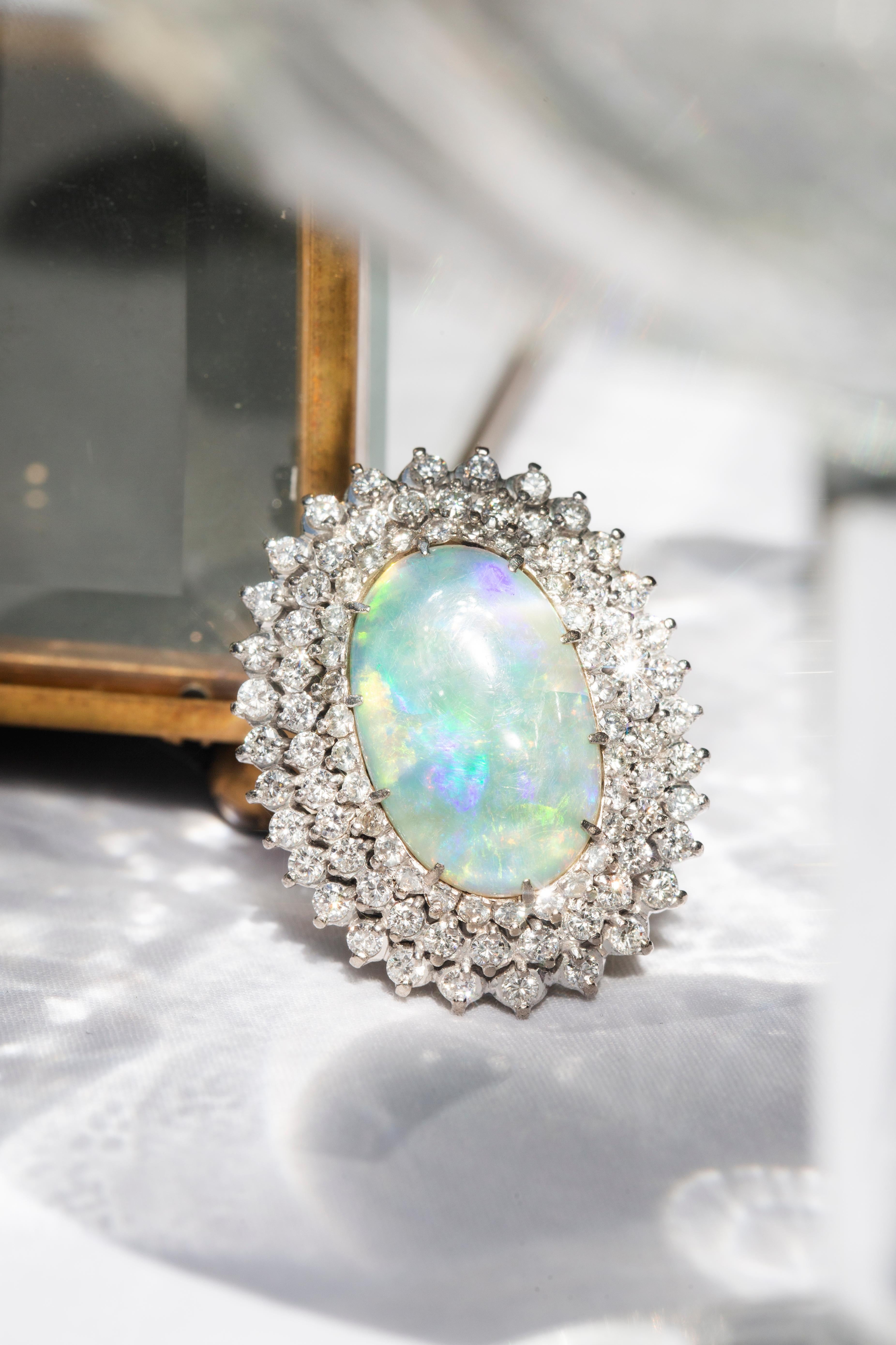 Vintage Circa 1970s Australian Oval Solid Opal & Diamond Halo Ring 18 Carat Gold For Sale 1