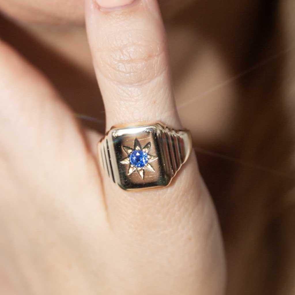 The Evander Ring is a handsome jewel, crafted in 9 carat gold, he is a force of strength and beauty.  Stepping up to a platform star-set with a bright blue sapphire, he is both quality and refinement, perfect for the man in your life.

The Evander