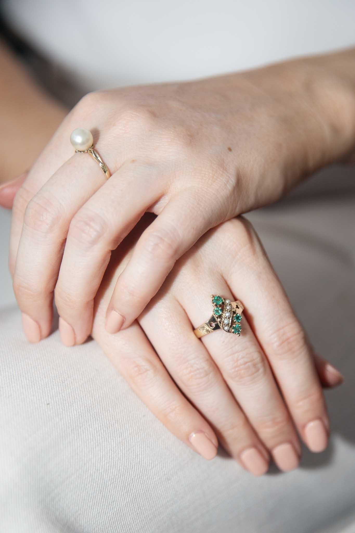 Beautifully crafted in 9 carat gold, The Sarai Ring is a vintage delight.  With her band lightly patterned and shining emeralds separated by a gently winding river of satiny seed pearls, she is a sweet inclusion in your jewellery collection.

The