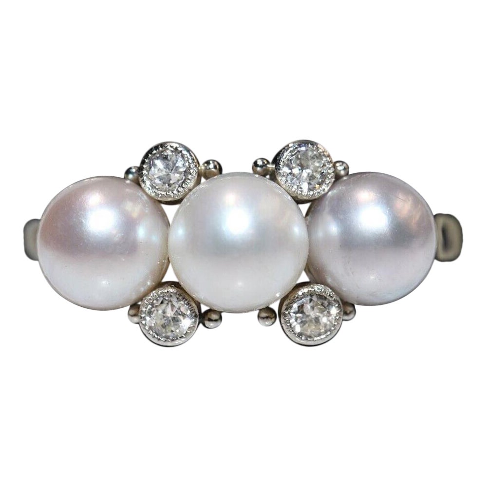 Anello con diamanti naturali e perle in oro 14k, vintage, degli anni
70 circa, realizzato a mano