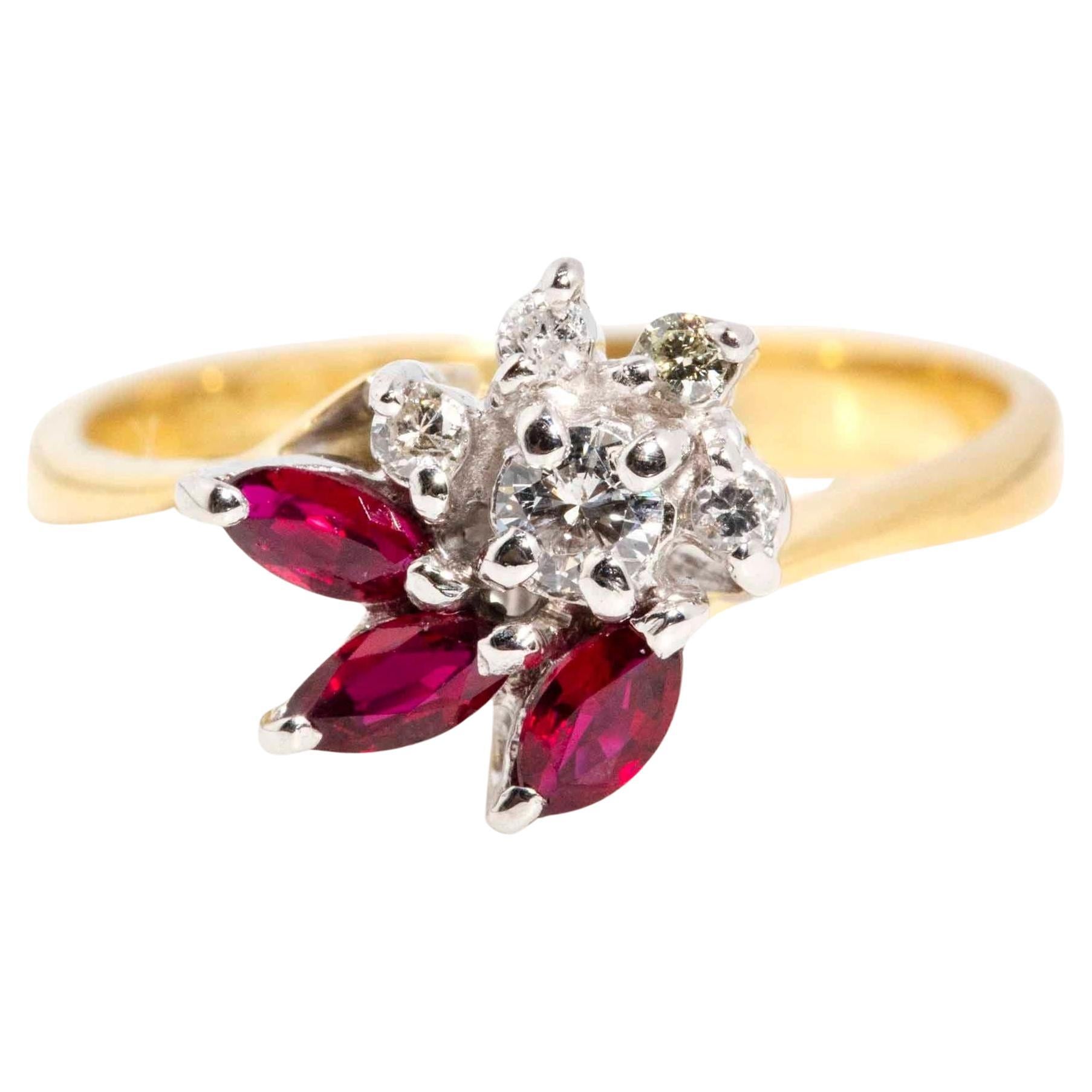 Vintage Circa 1970s Marquise Ruby & Diamond Flower Cluster Ring 18 Carat Gold For Sale