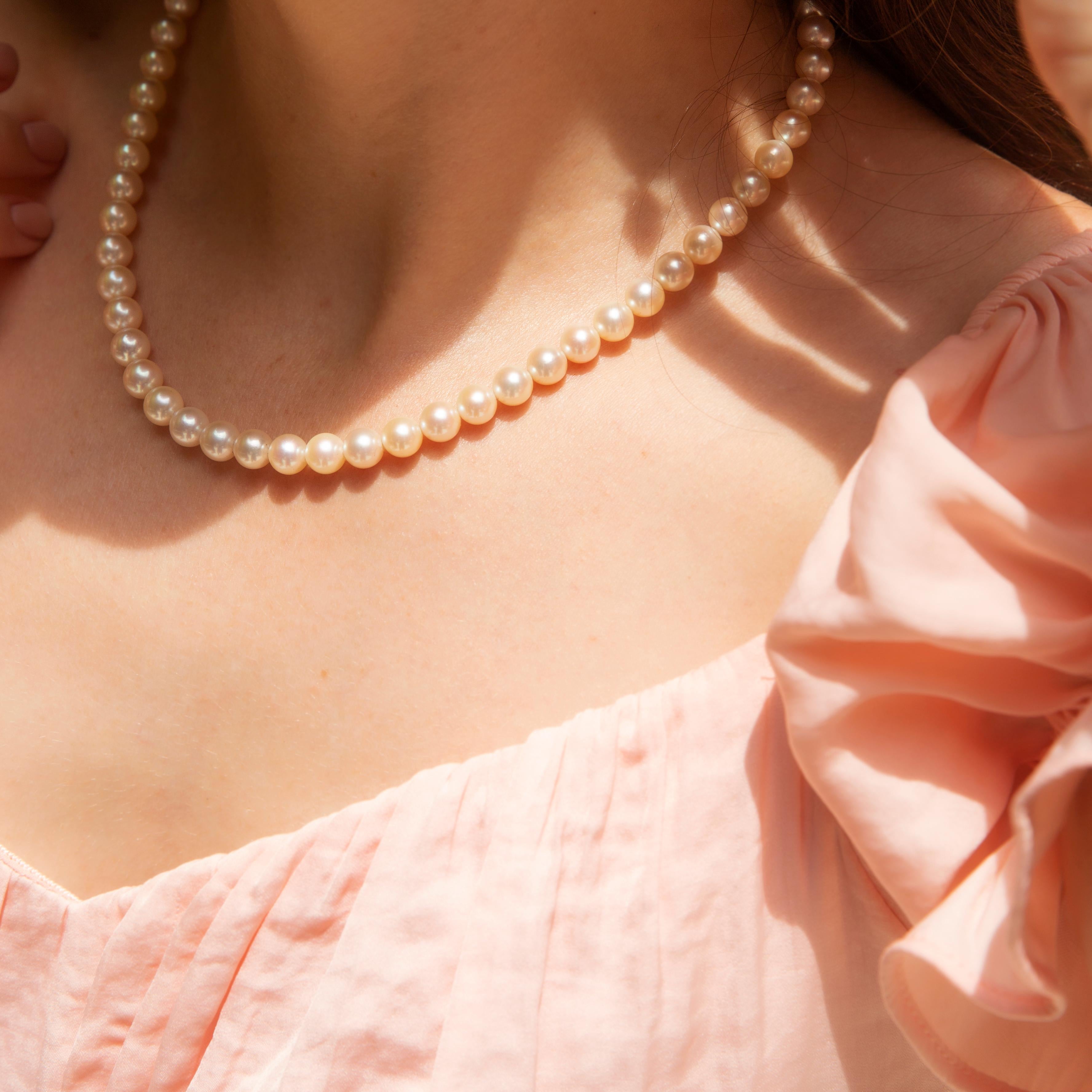 Thoughtfully strung together, this gorgeous strand of fifty-seven round off-white cultured Akoya pearls radiates with high lustre. We have named this stunningly elegant piece The Mikimoto Necklace. Lovely for wearing any time or place, she is