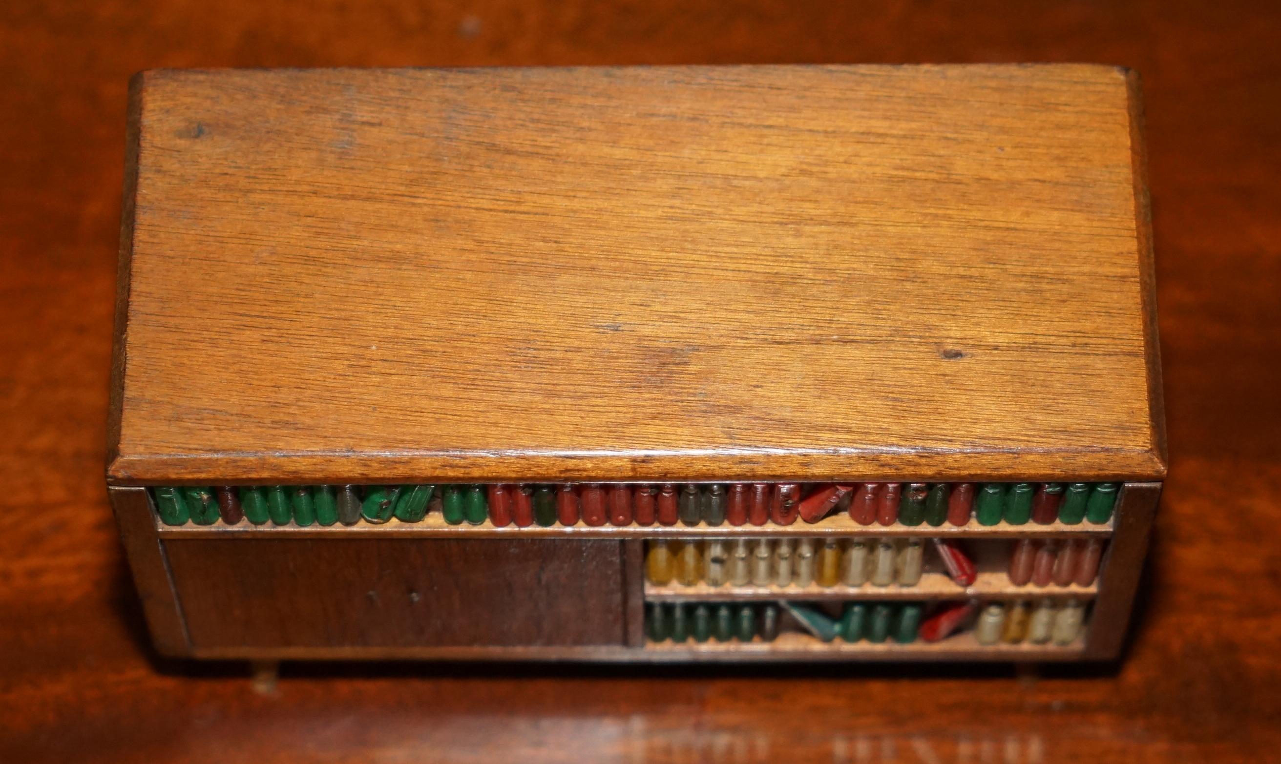 Folk Art VINTAGE CIRCA 1970'S MUSICAL MINIATURE FOLK ART CIGARETTE CiGAR DISPENSER For Sale