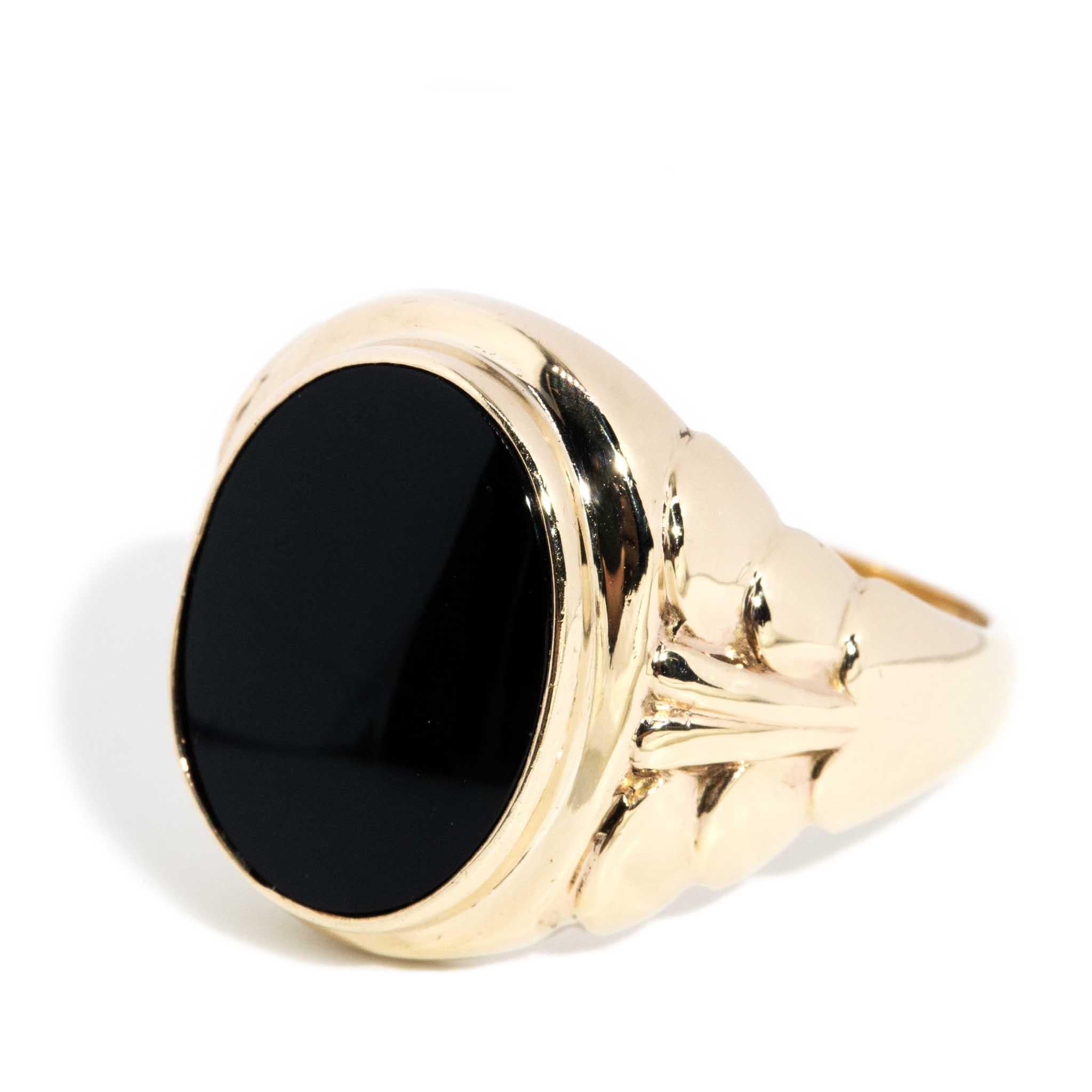 Modern Vintage Circa 1970s Oval Onyx Ring 9 Carat Yellow Gold For Sale