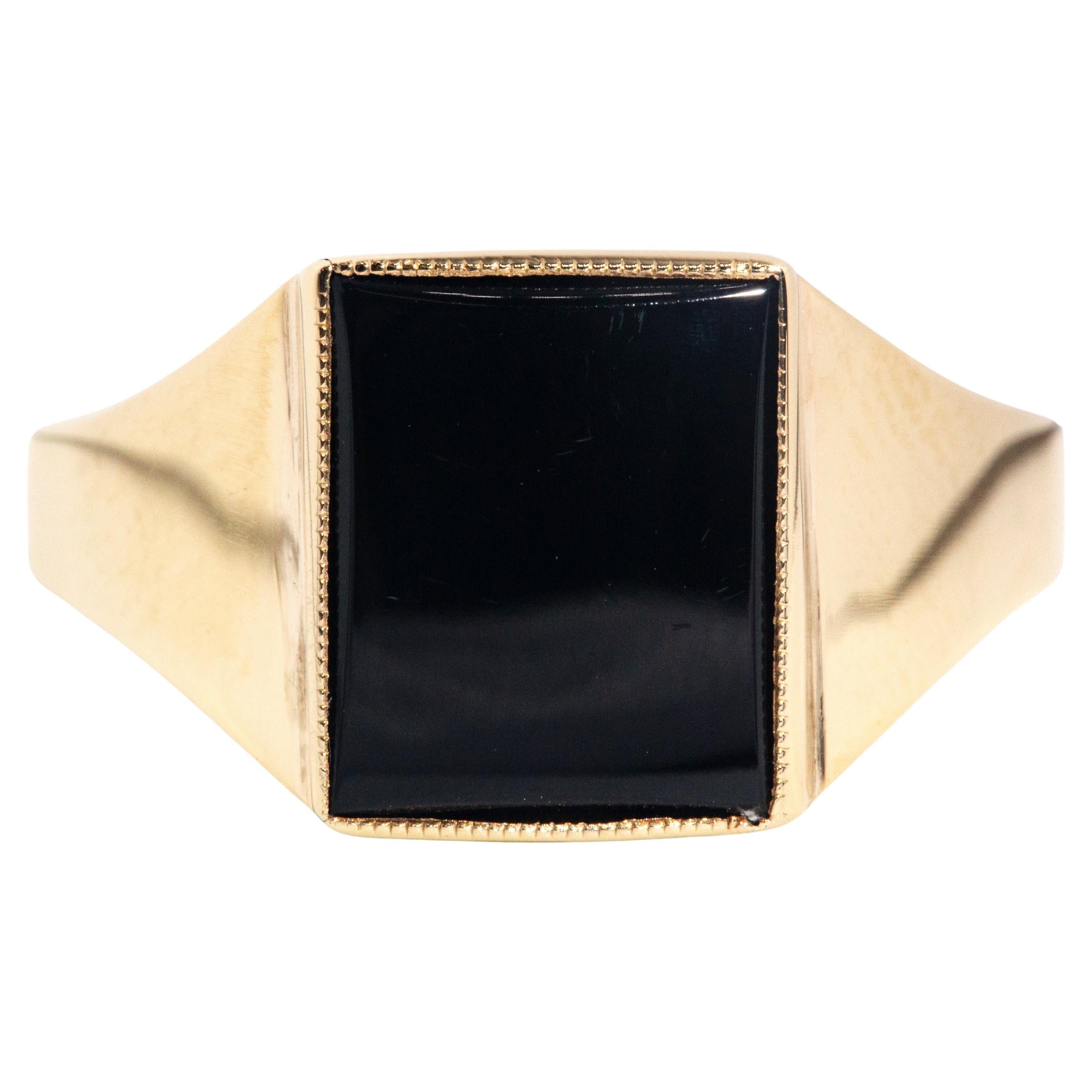 Vintage Circa 1970s Rectangular Buff Top Black Onyx Ring 9 Carat Yellow Gold For Sale