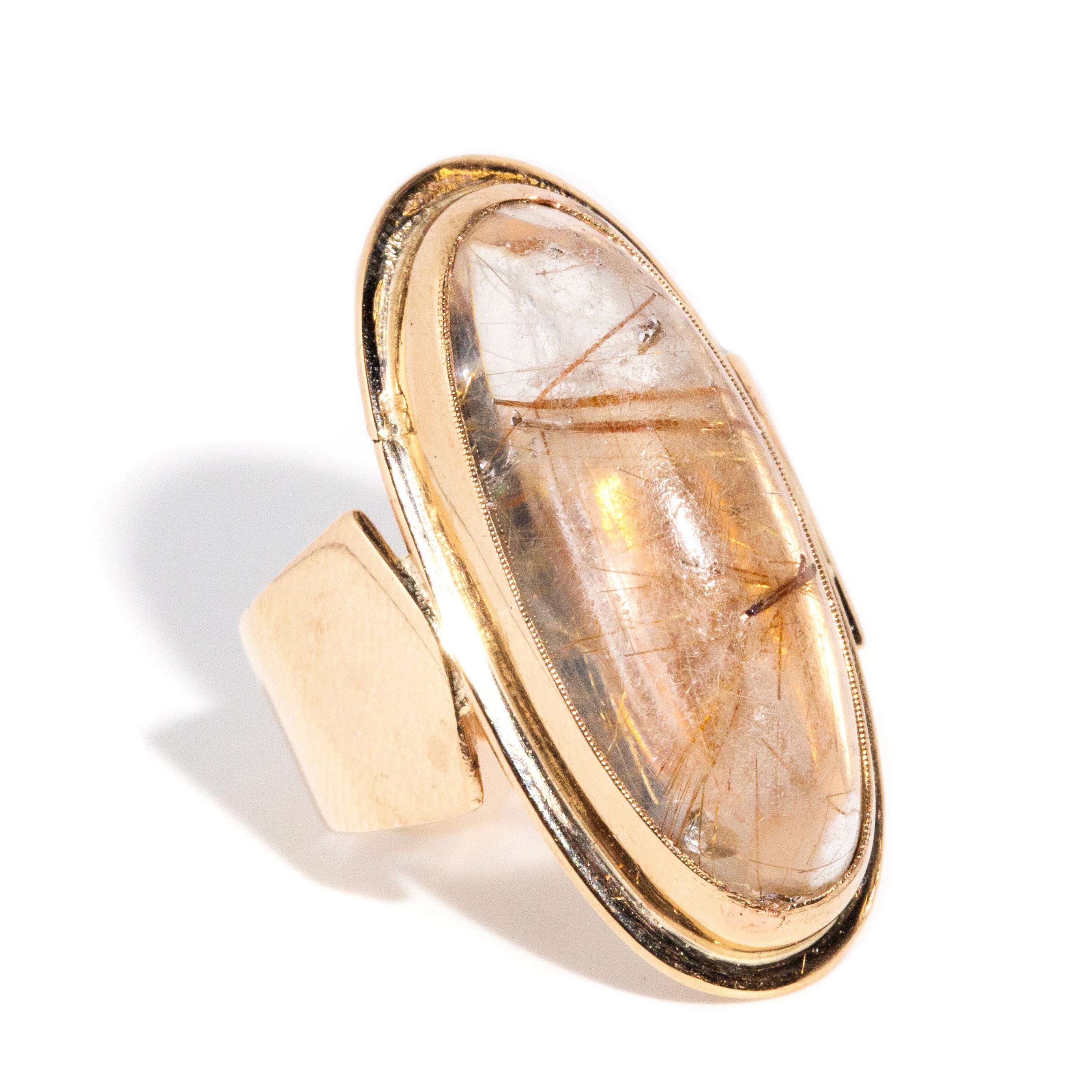 Modern Vintage Circa 1970s Rubover Rutilated Quartz Cabochon Ring 9 Carat Yellow Gold For Sale