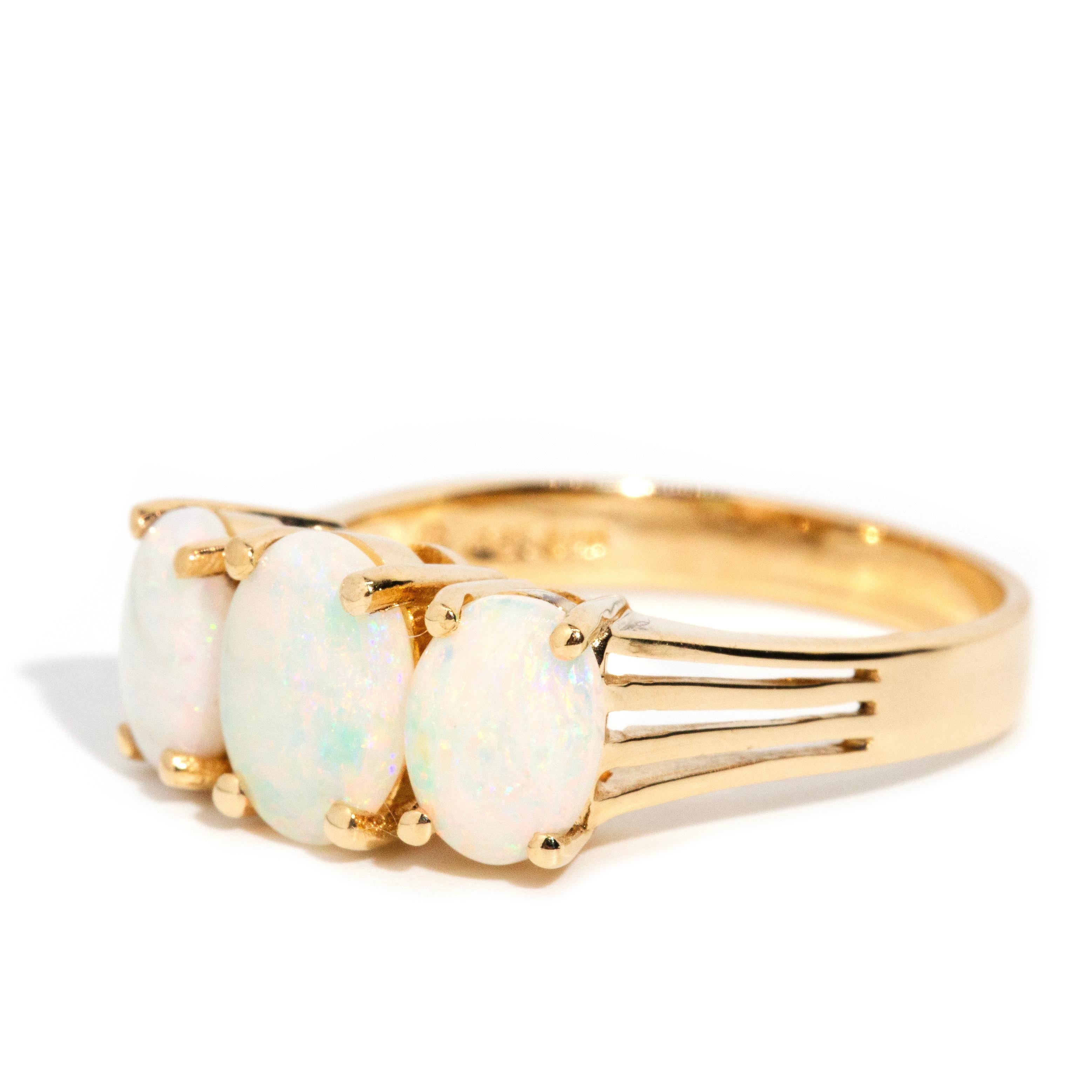 Modern Vintage Circa 1970s Solid White Australian Opal Three Stone Ring 14 Carat Gold For Sale