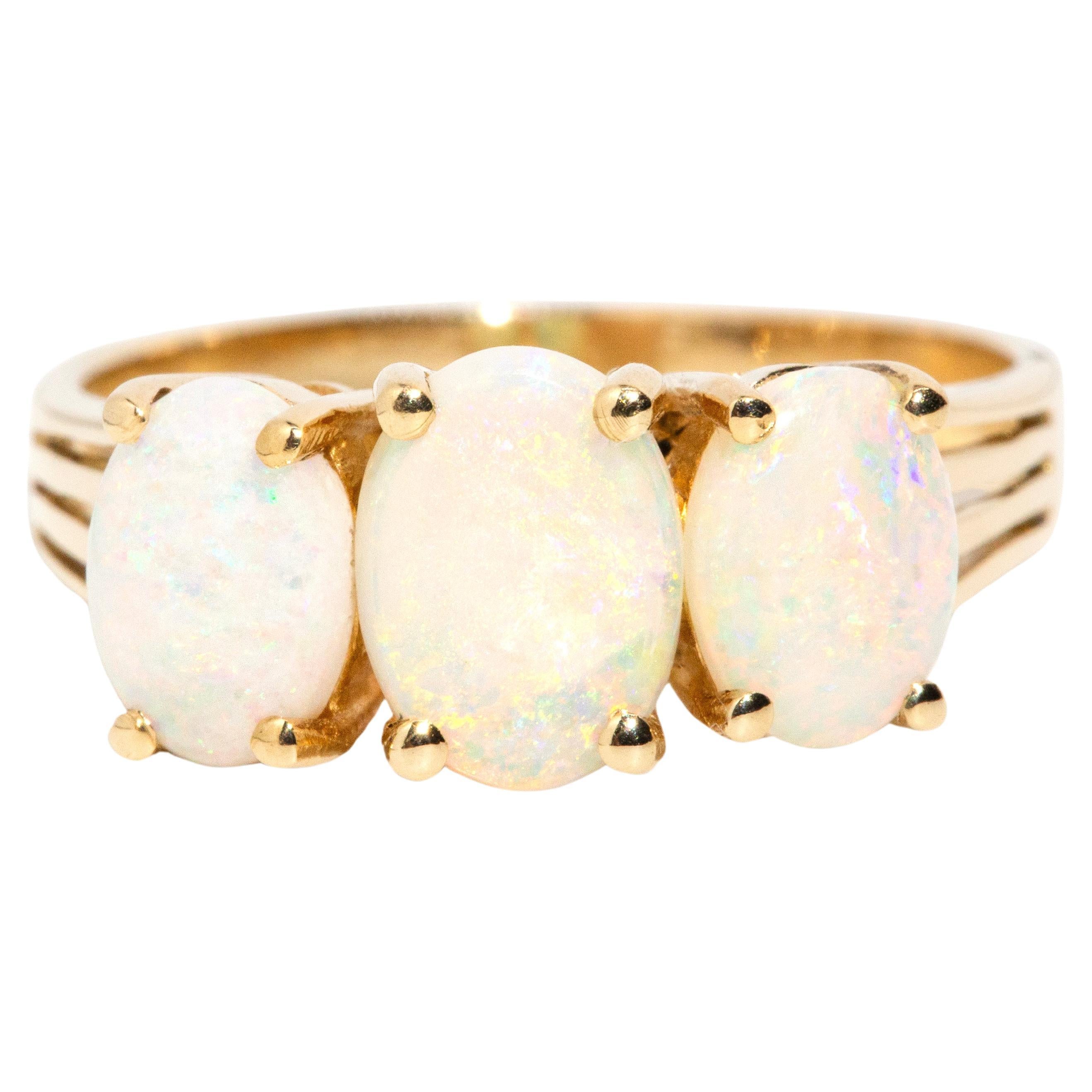 Vintage Circa 1970s Solid White Australian Opal Three Stone Ring 14 Carat Gold For Sale