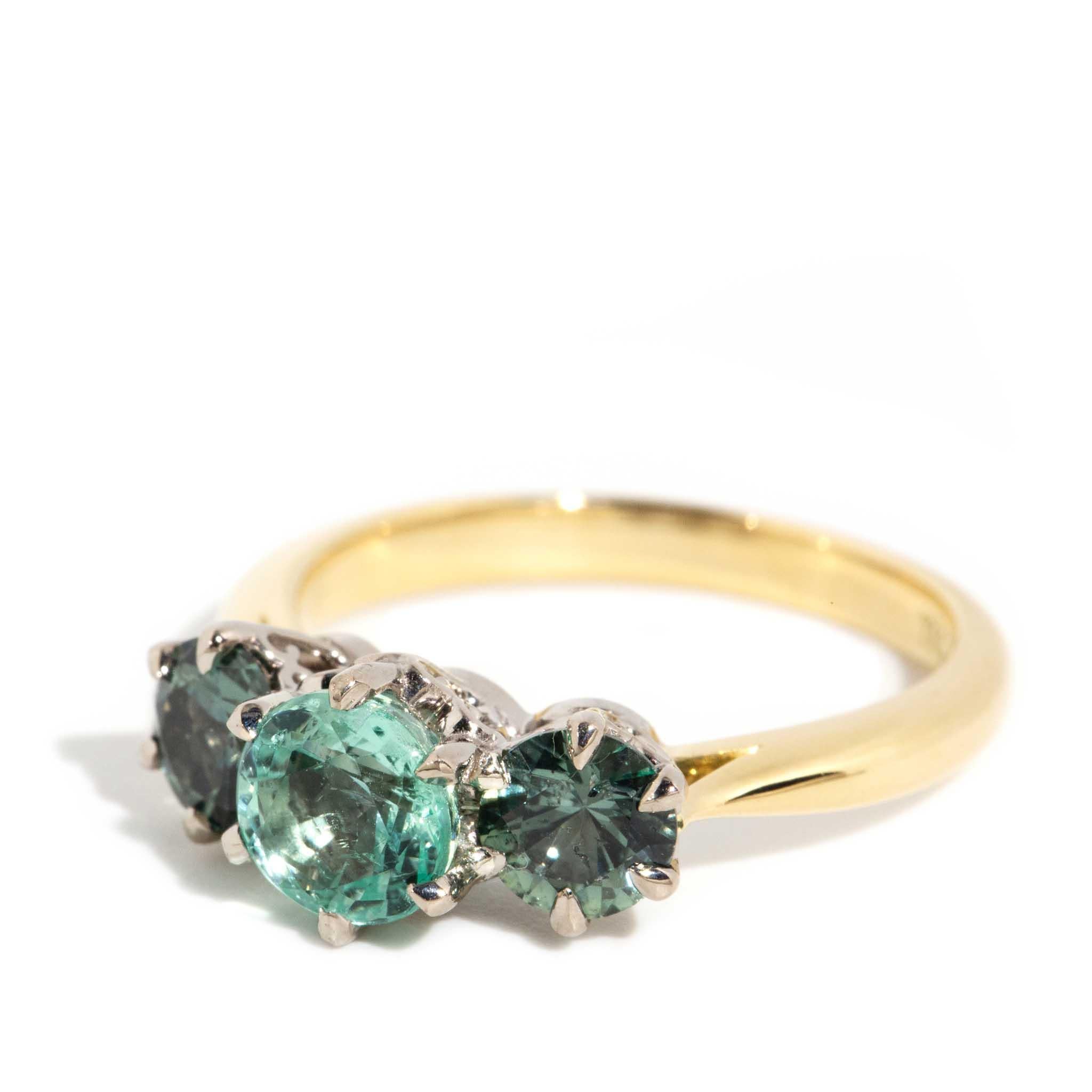 Round Cut Vintage Circa 1980s 0.95 Carat Emerald & 1.07 Carat Sapphire Ring 18 Carat Gold For Sale