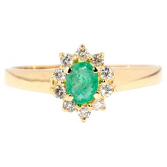Vintage circa 1980s 14 Carat Yellow Gold Diamond 
Light Green Emerald Halo Ring