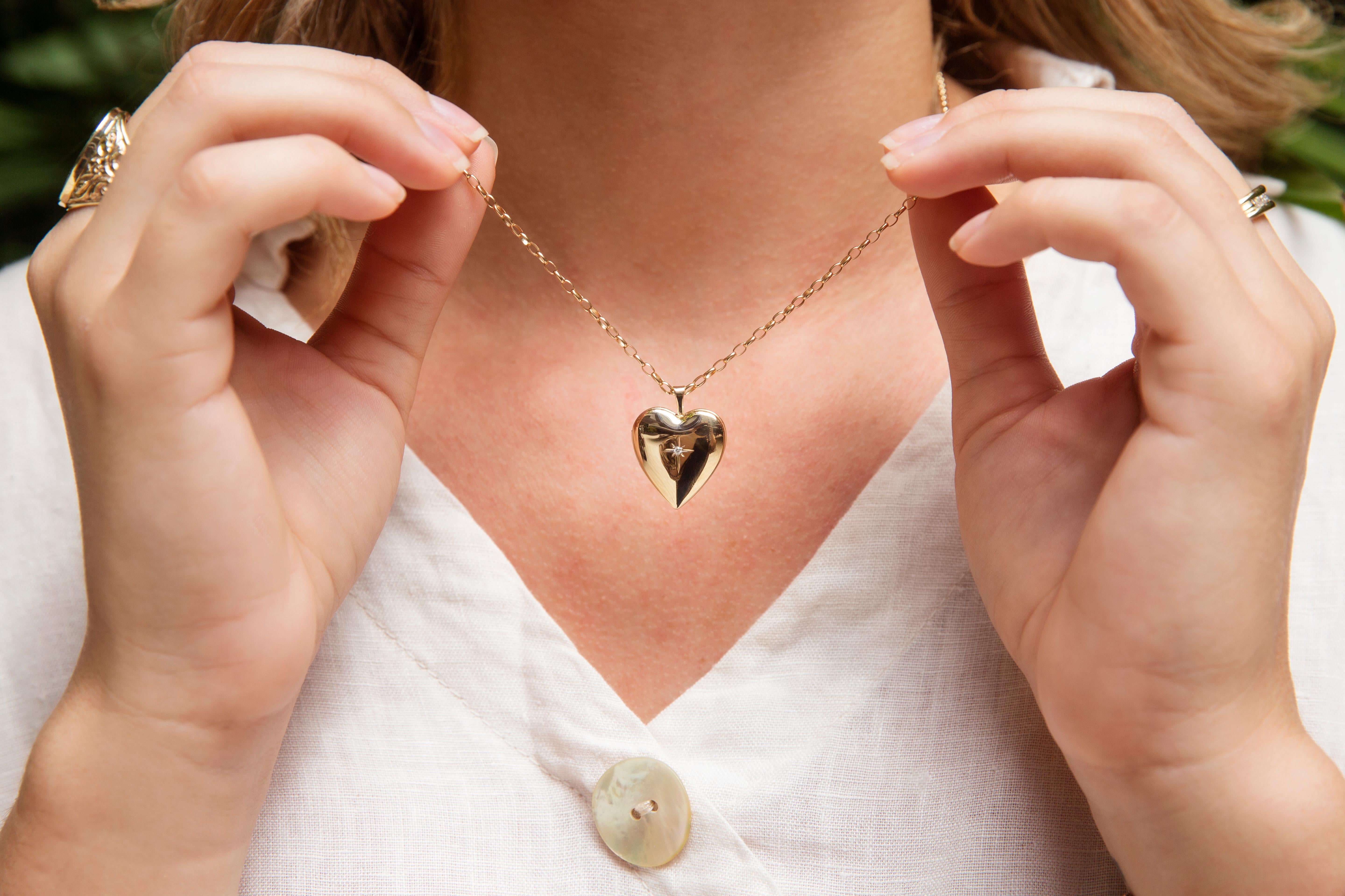 Crafted in 14 carat yellow gold, this gorgeous pendant is a heart-shaped locket with a darling star set diamond shimmering in the centre and threaded with an elegant 9 carat belcher chain. We have named her The Saige Pendant & Chain. As graceful as